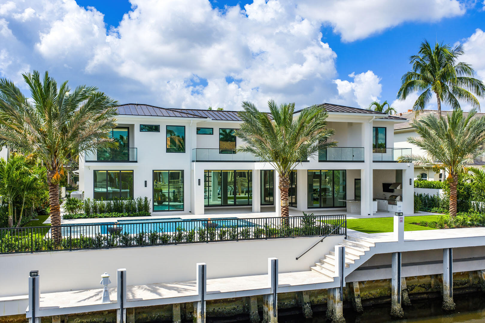 191 Coconut Palm Road Boca Raton, FL 33432 - Photo 71 of 81 a view of a chair and table in front of house
