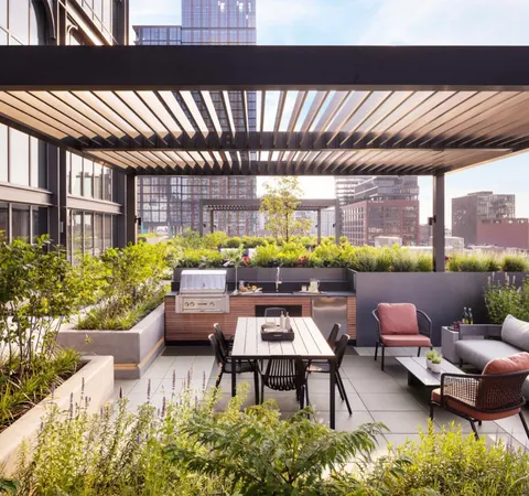 a outdoor living space with furniture and a potted plant