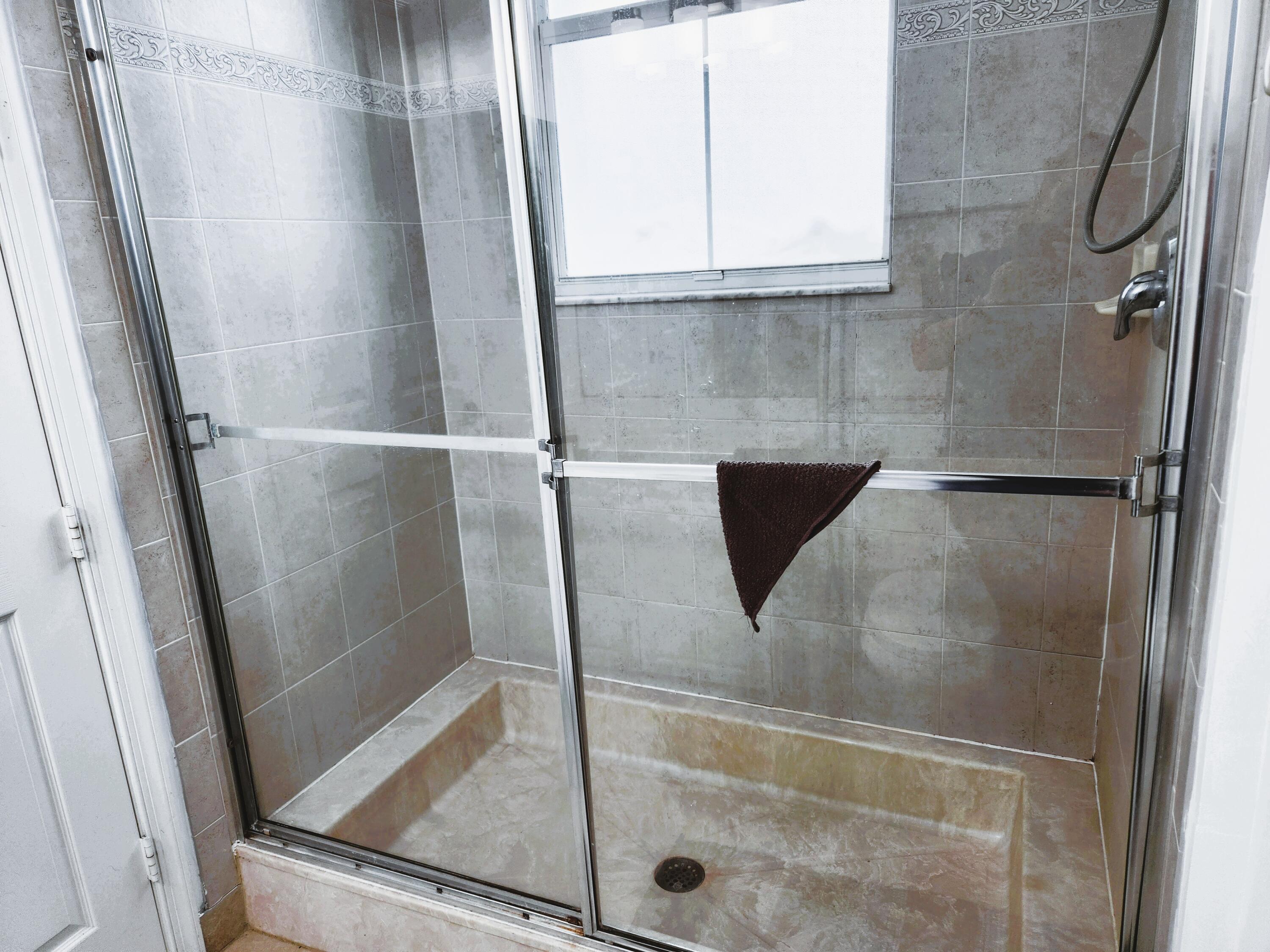 1480 Frederick Small Road Jupiter, FL 33458 - Photo 16 of 45 1480 Frederick SMALL MASTER BA SHOWER 1