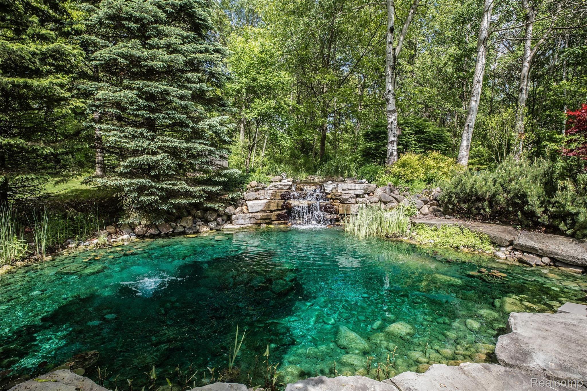 5542 Clarkston Road Clarkston, MI 48348 - Photo 74 of 85 GORGEOUS POND WITH WATERFALL