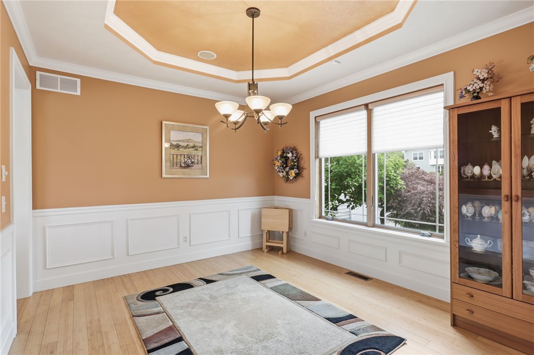 4536 Crystal Ridge Circle Gorham, NY 14424 - Photo 8 of 48 This Formal Dining Room features a stunning tray ceiling that serves as a beautiful focal point for the space.