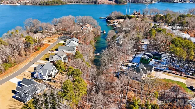 a view of a lake with a house