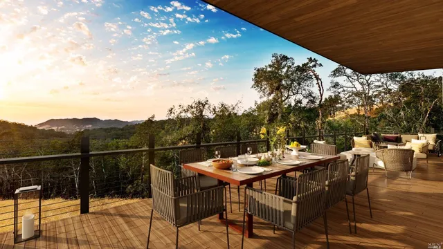 a bedroom with furniture and a large window