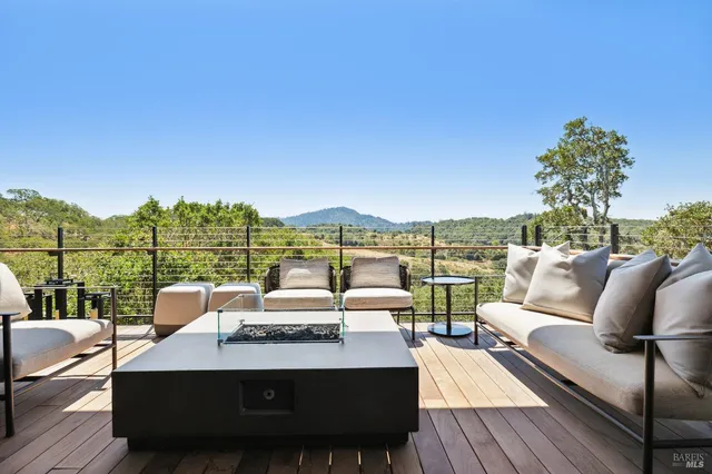 a bath tub sitting next to a bathroom sink