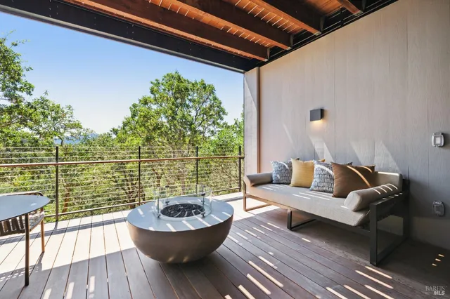 a yellow house with trees in front of it