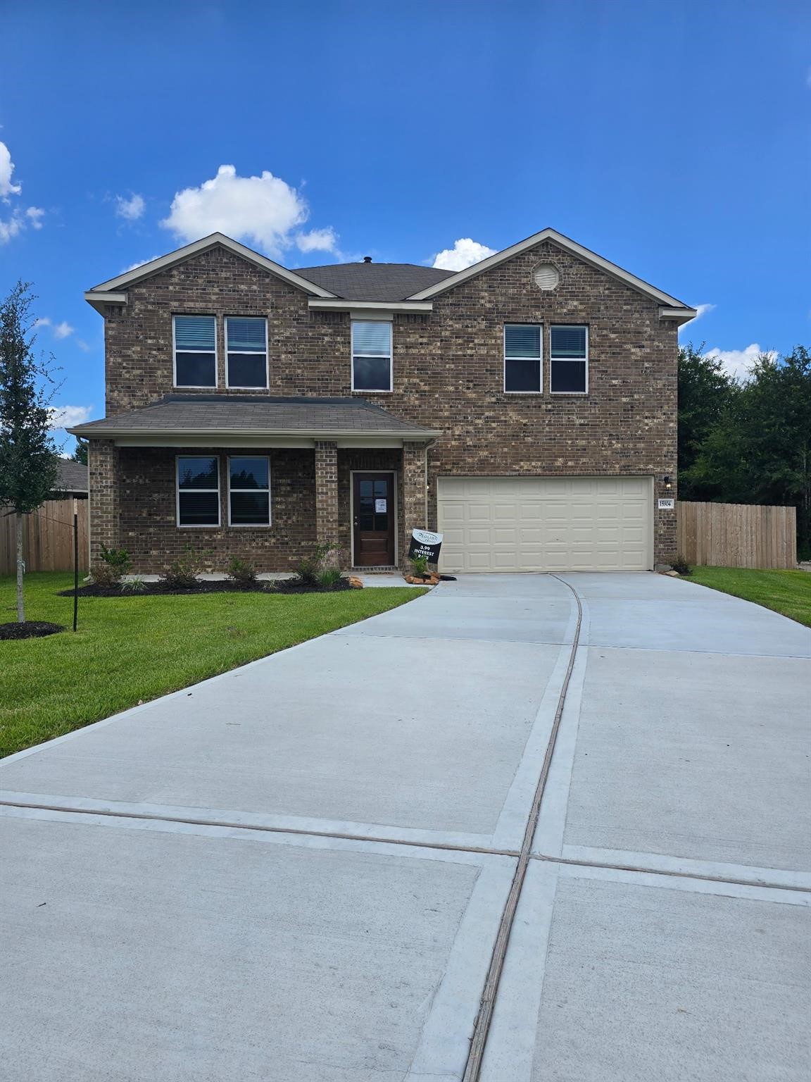 15905 Cy Young Court Splendora, TX 77372 - Photo 2 of 16 a front view of house with yard and green space
