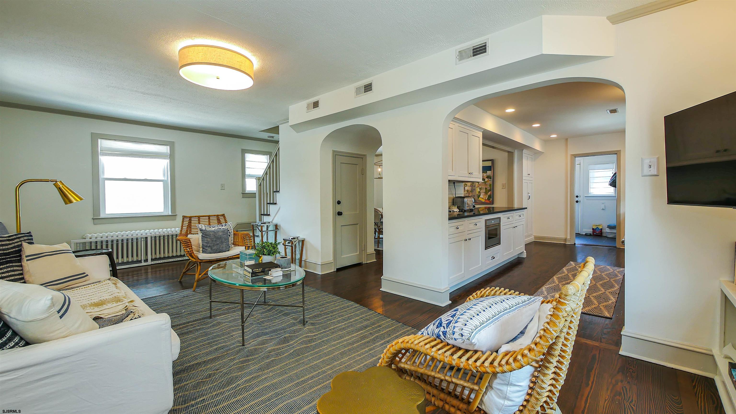 118 Pinnacle Road Ocean City, NJ 08226 - Photo 11 of 49 a living room with furniture and a flat screen tv