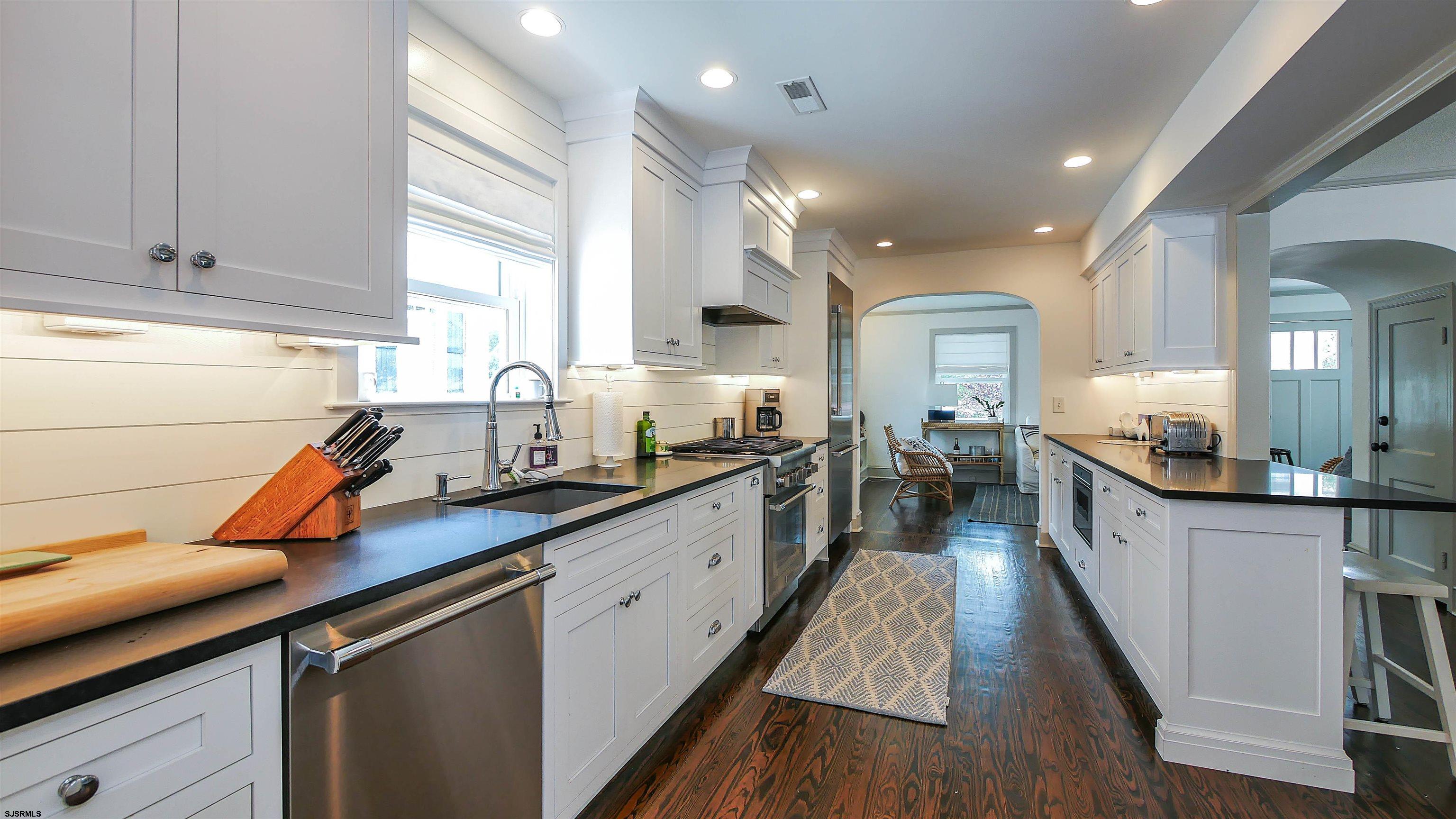118 Pinnacle Road Ocean City, NJ 08226 - Photo 16 of 49 a large kitchen with lots of counter space a sink and appliances