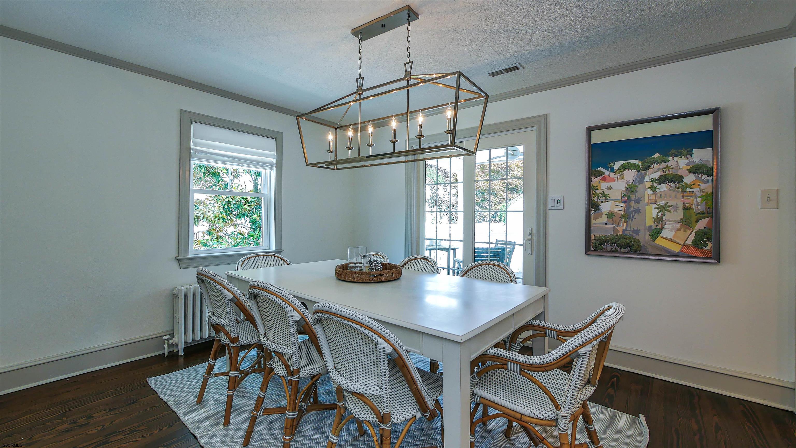 118 Pinnacle Road Ocean City, NJ 08226 - Photo 18 of 49 a view of a dining room with furniture window and wooden floor