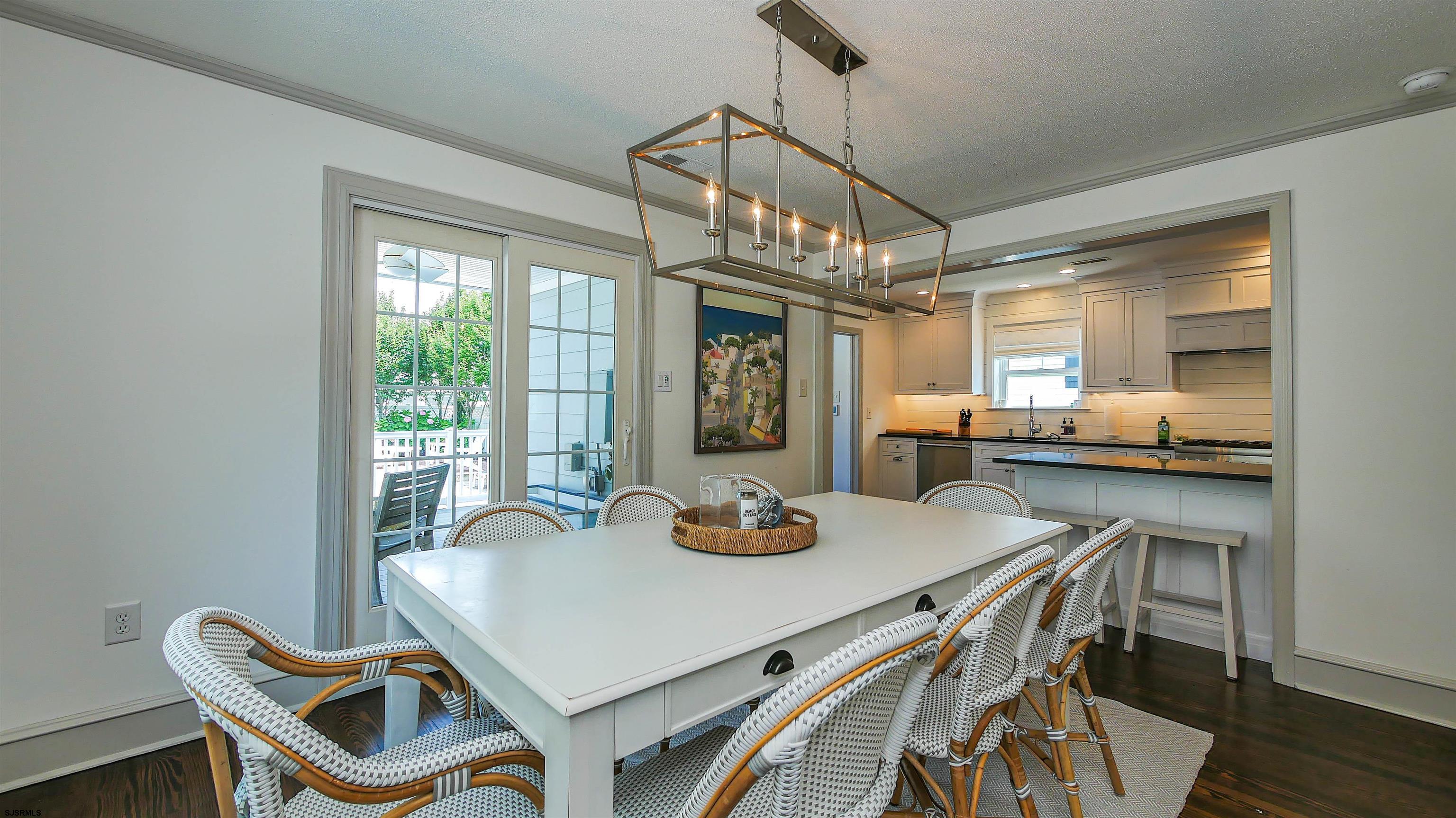 118 Pinnacle Road Ocean City, NJ 08226 - Photo 19 of 49 a view of a dining room with furniture window and wooden floor