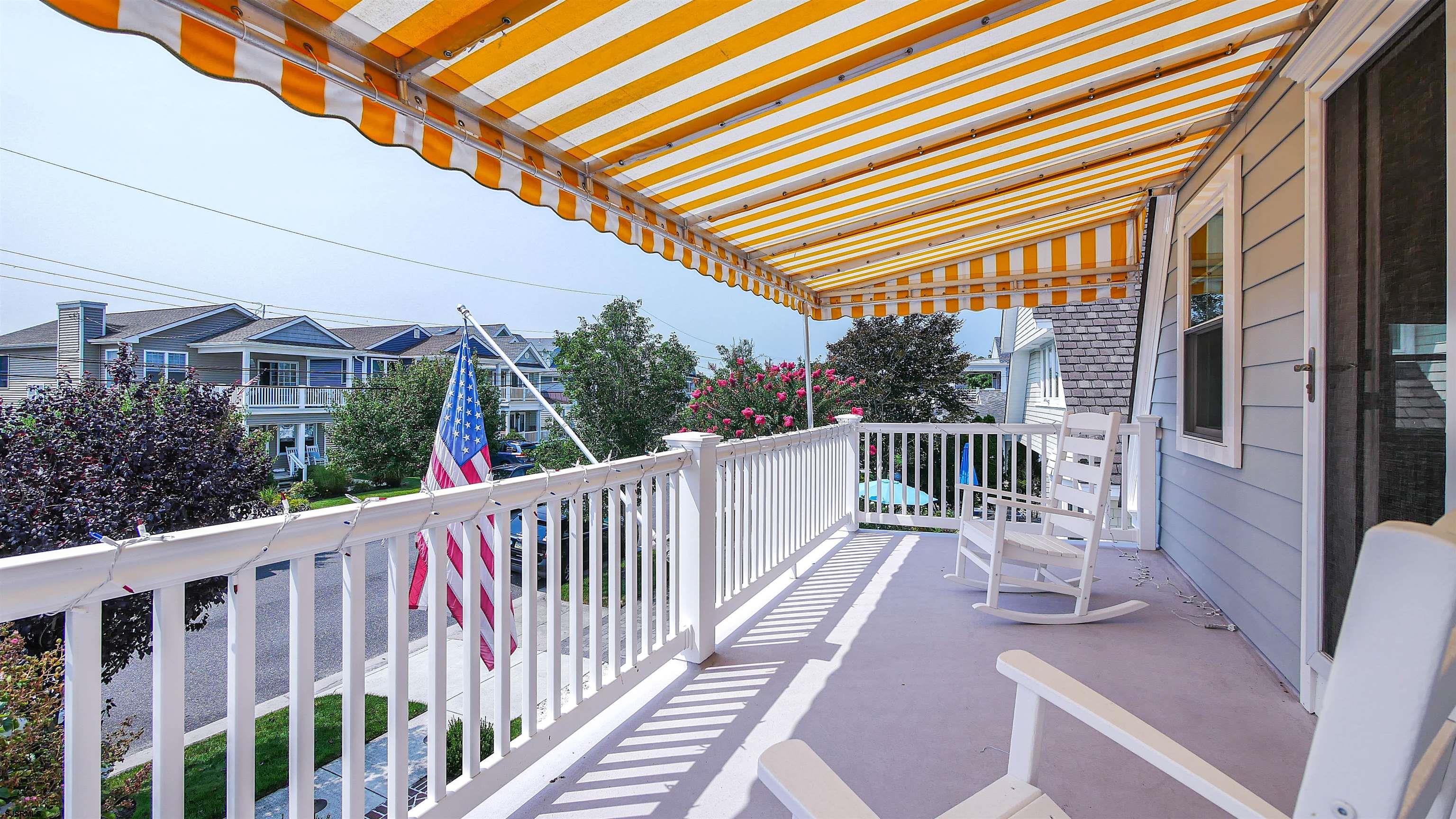 118 Pinnacle Road Ocean City, NJ 08226 - Photo 28 of 49 a view of a chair and table in the balcony