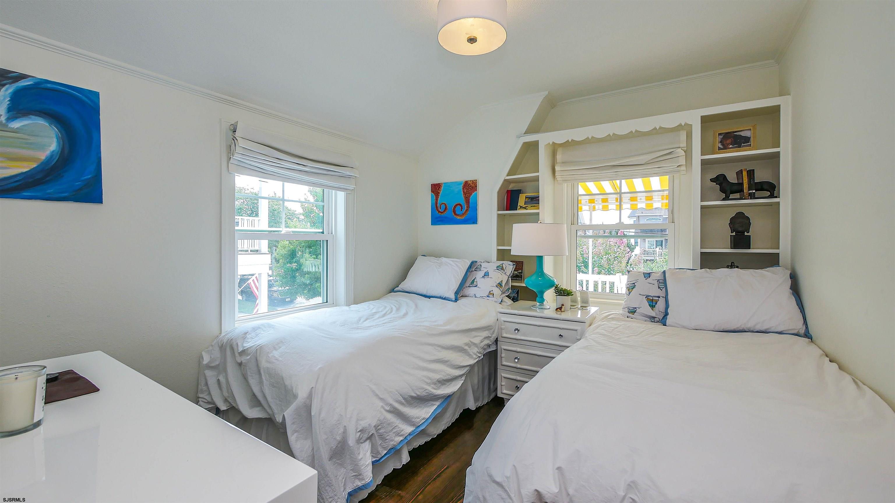 118 Pinnacle Road Ocean City, NJ 08226 - Photo 29 of 49 a bedroom with a bed and a window