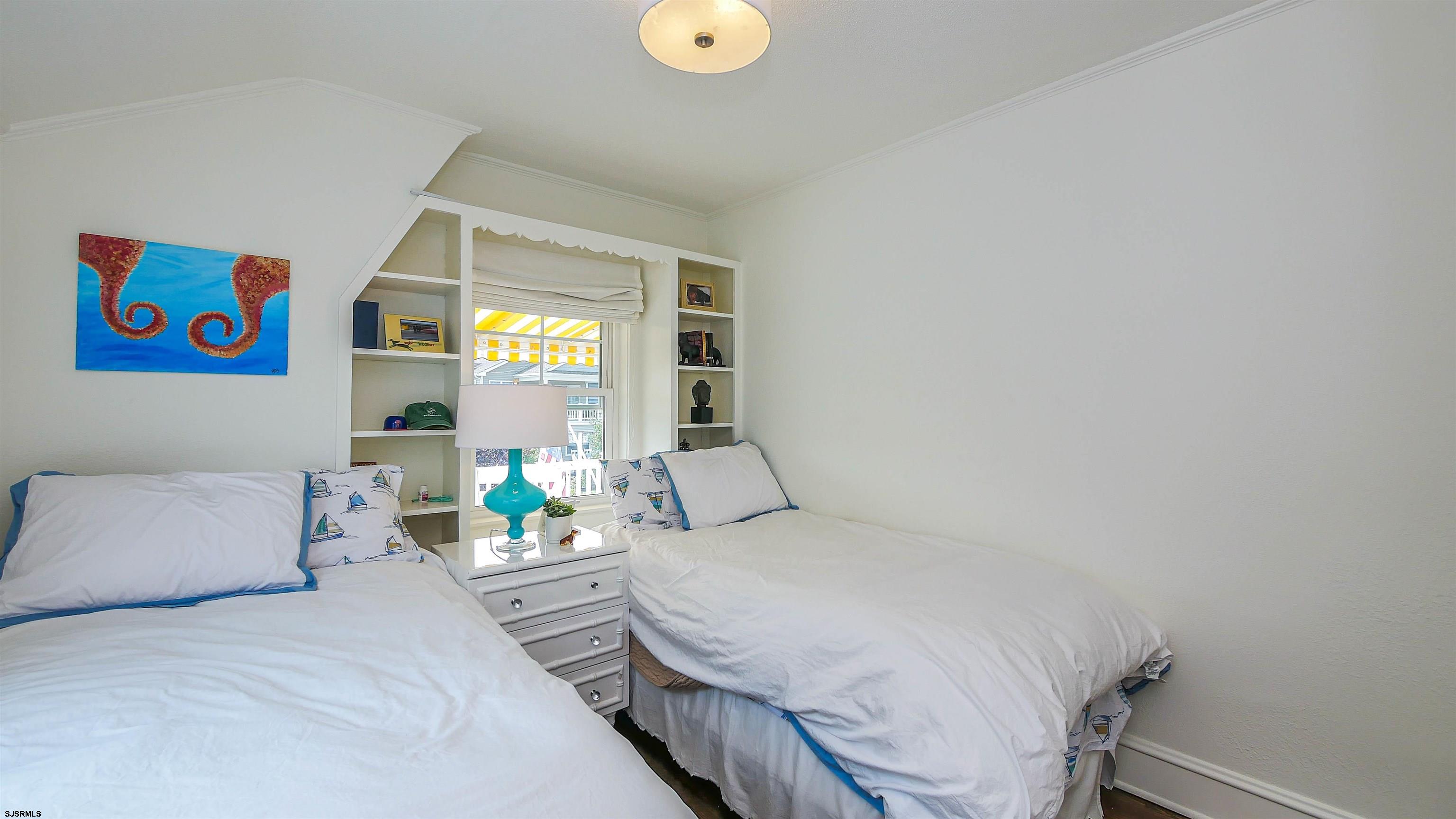 118 Pinnacle Road Ocean City, NJ 08226 - Photo 30 of 49 a bedroom with a bed and window