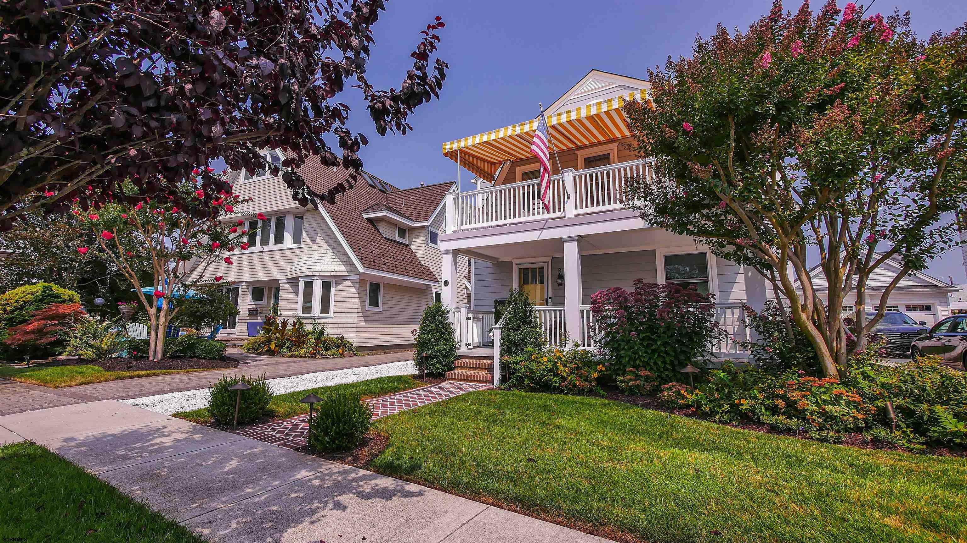 118 Pinnacle Road Ocean City, NJ 08226 - Photo 3 of 49 a front view of a house with a yard
