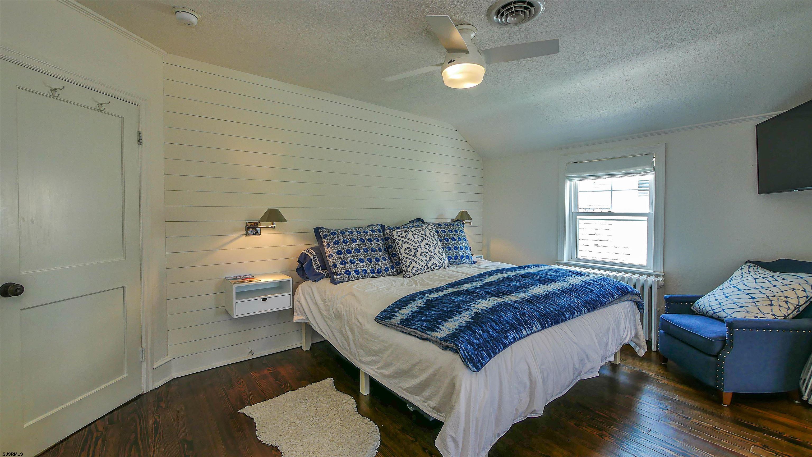 118 Pinnacle Road Ocean City, NJ 08226 - Photo 34 of 49 a bedroom with a bed and a window