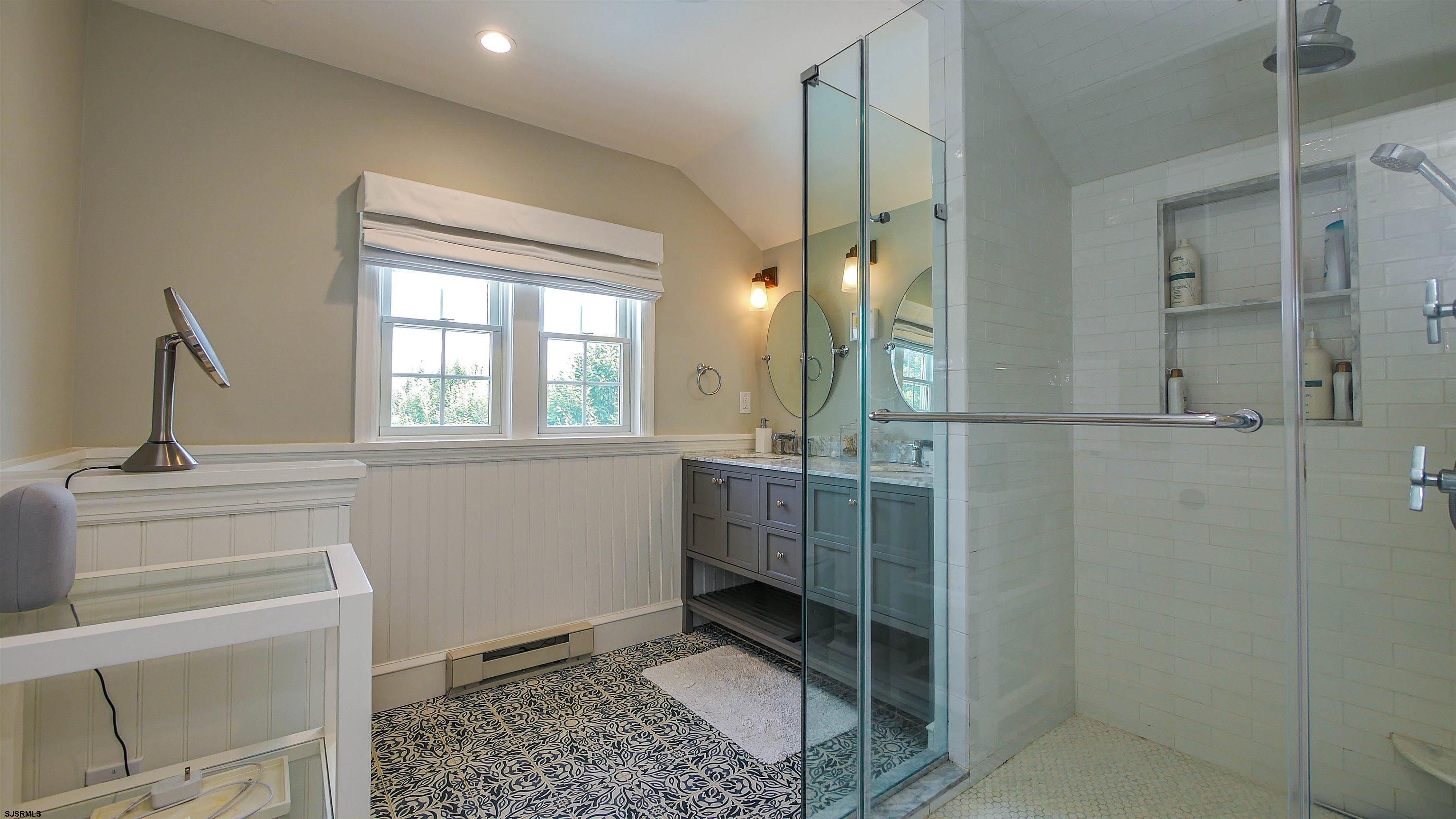 118 Pinnacle Road Ocean City, NJ 08226 - Photo 38 of 49 a room with a window and chandelier