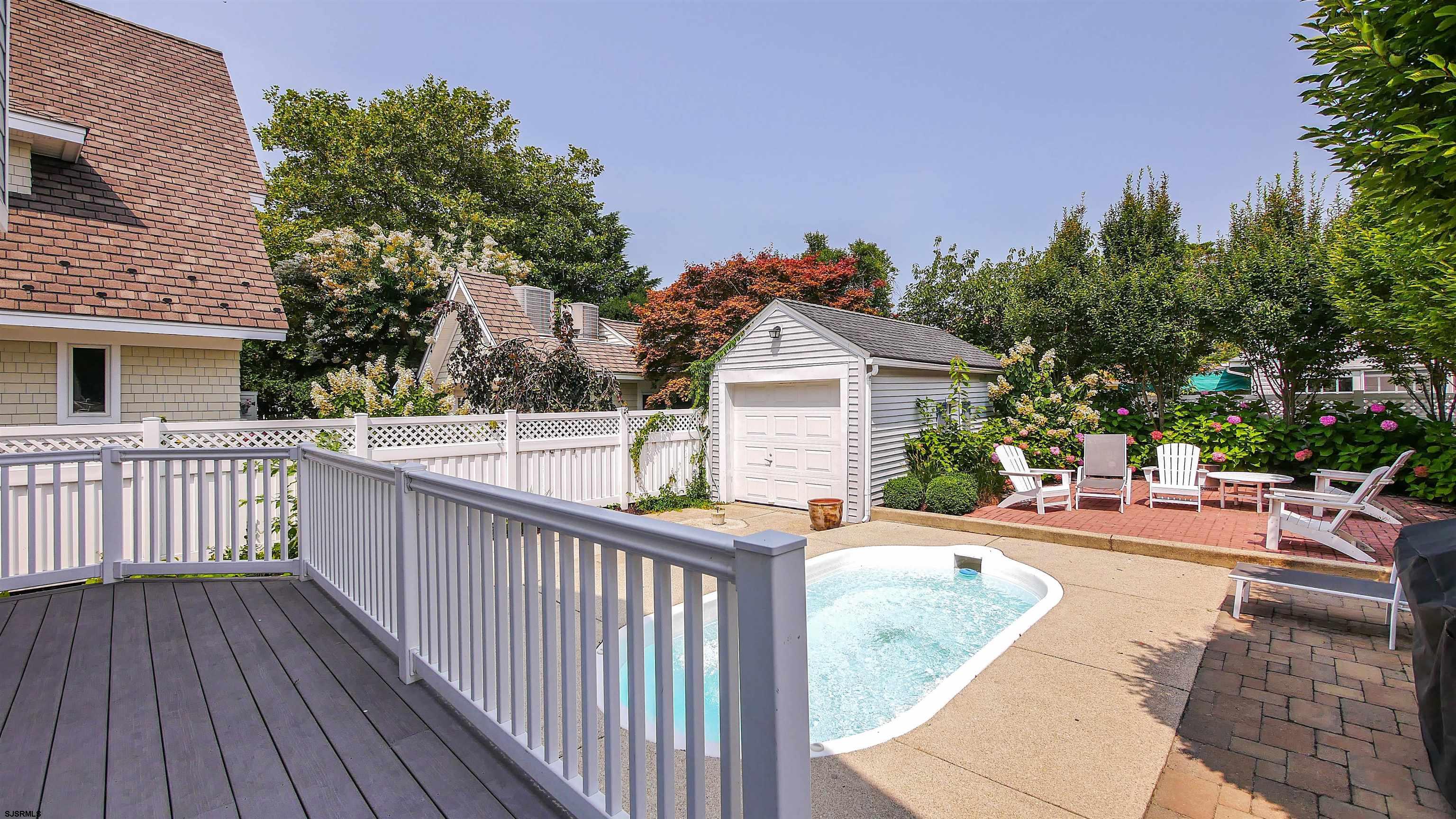 118 Pinnacle Road Ocean City, NJ 08226 - Photo 45 of 49 a balcony with wooden floor and fence