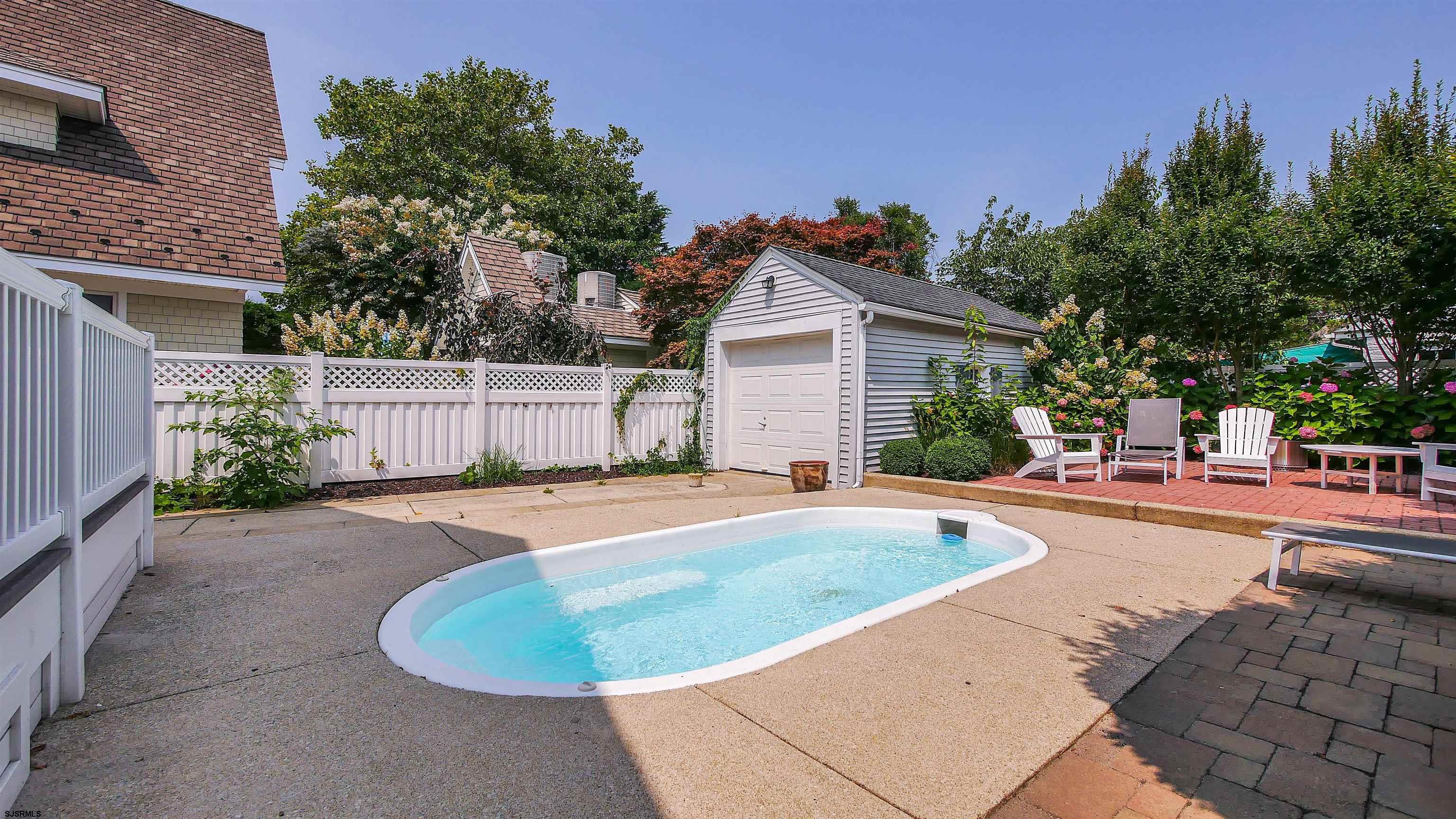 118 Pinnacle Road Ocean City, NJ 08226 - Photo 46 of 49 a view of a house with backyard and sitting area