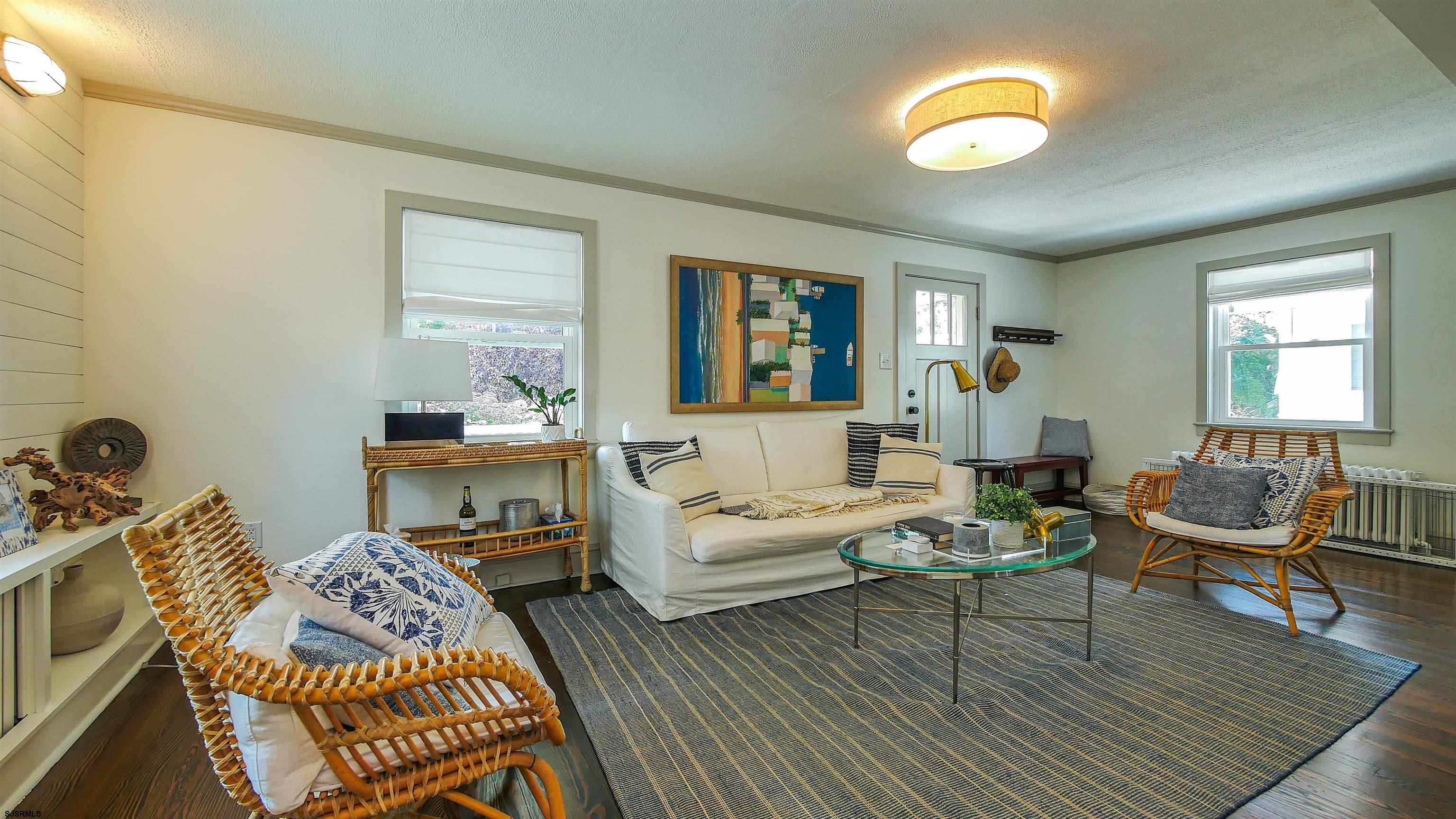 118 Pinnacle Road Ocean City, NJ 08226 - Photo 10 of 49 a living room with furniture and a wooden floor