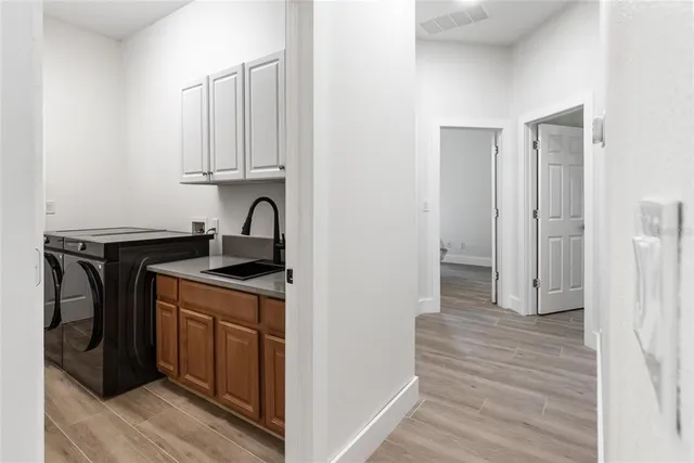 a kitchen with stainless steel appliances granite countertop a stove and a refrigerator