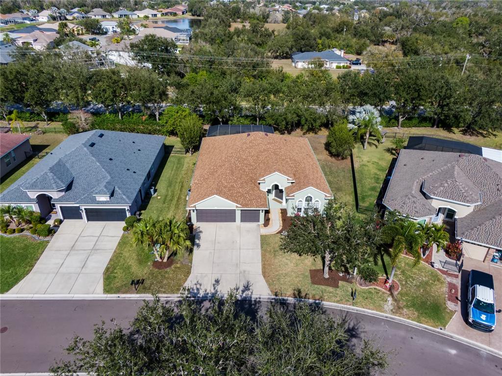 12516 24th Street East Parrish, FL 34219 - Photo 37 of 47 an aerial view of multiple houses with yard
