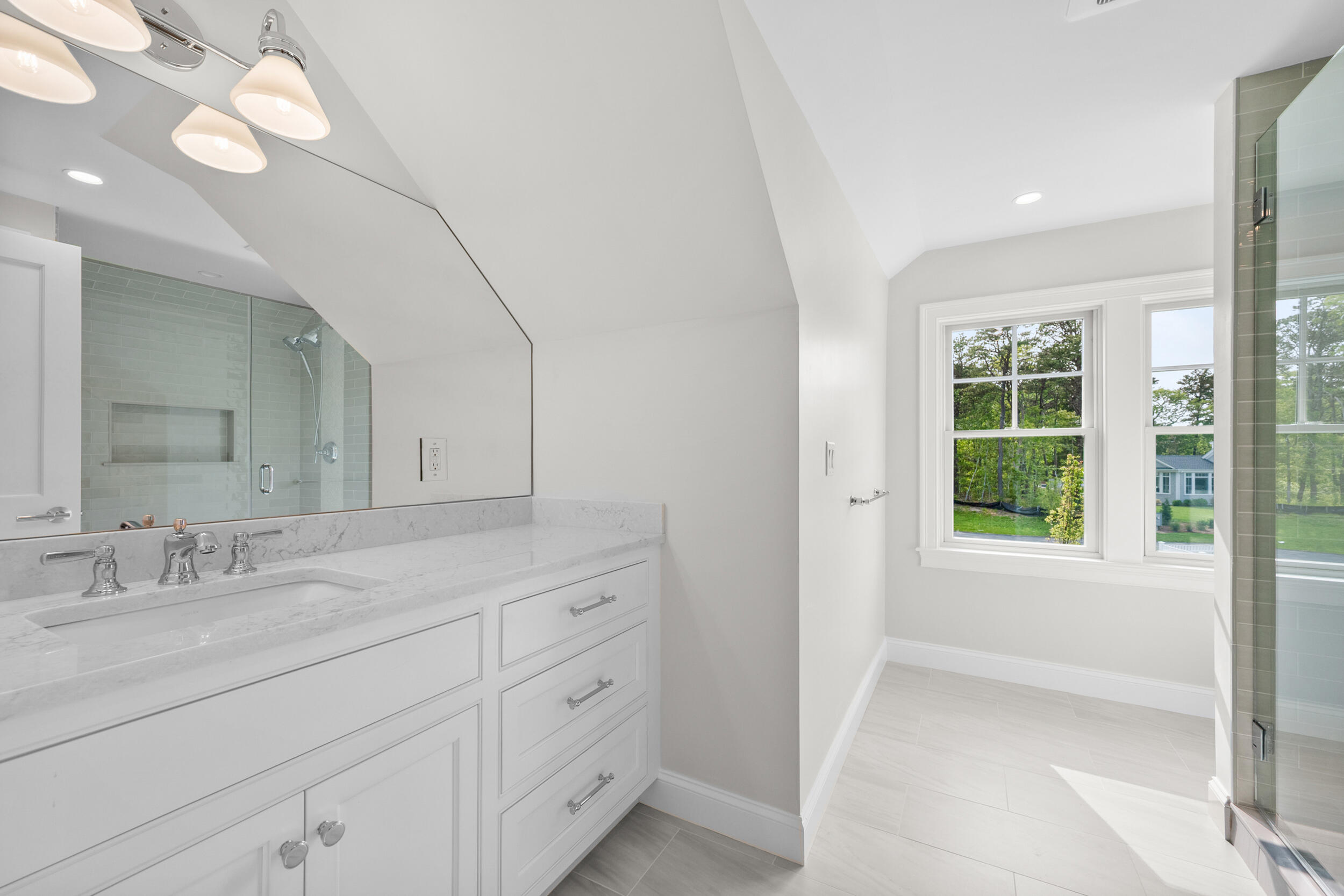 16 Bascom Hollow Harwich, MA 02645 - Photo 19 of 24 a bathroom with a sink vanity granite and a mirror