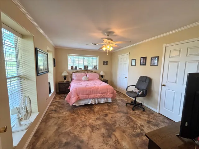 a bathroom with a sink a toilet and a shower