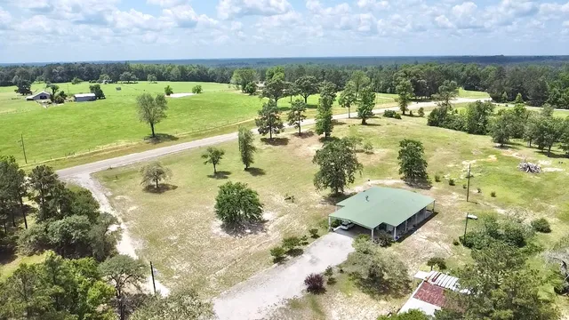 a view of a lake with a yard