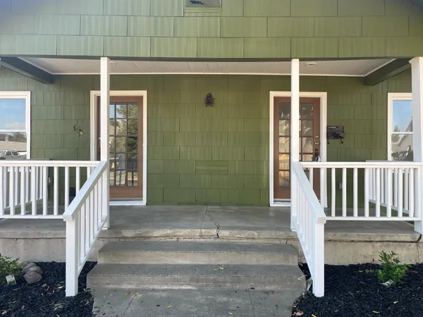 a view of entrance gate of a house