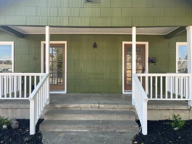 a view of entrance gate of a house
