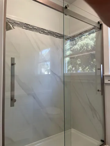 a kitchen with sink and cabinets