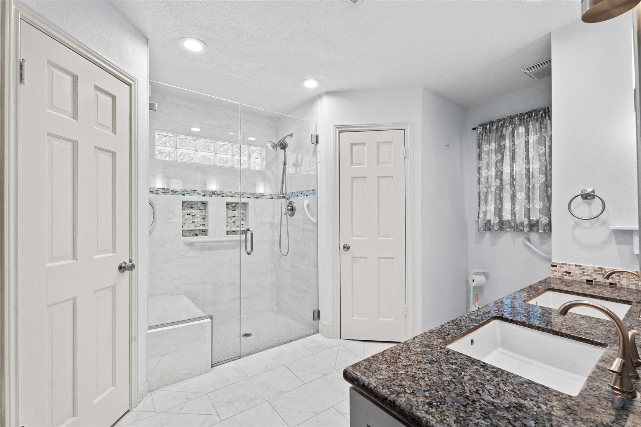 25319 Old Carriage Lane Spring, TX 77373 - Photo 22 of 35 a bedroom with a bed and a dresser