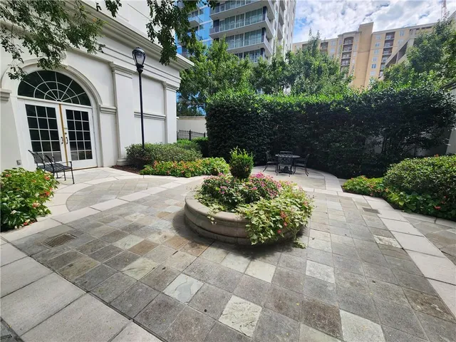 a view of a garden with potted plants