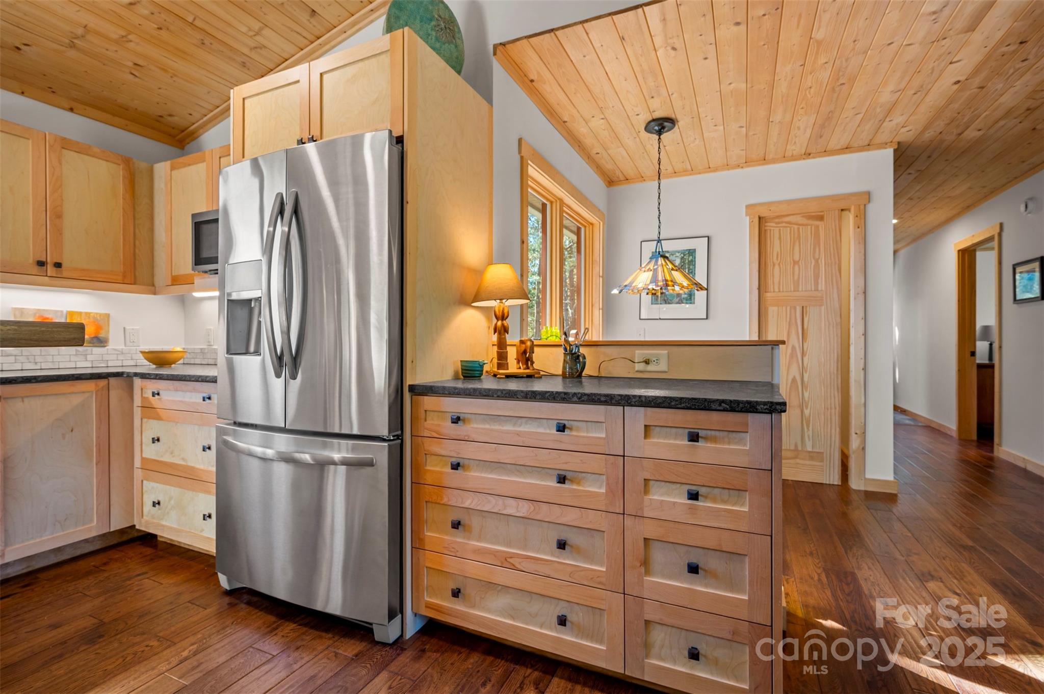 891 Meadow Crest Road Tryon, NC 28782 - Photo 17 of 47 a kitchen with stainless steel appliances a refrigerator and a stove top oven