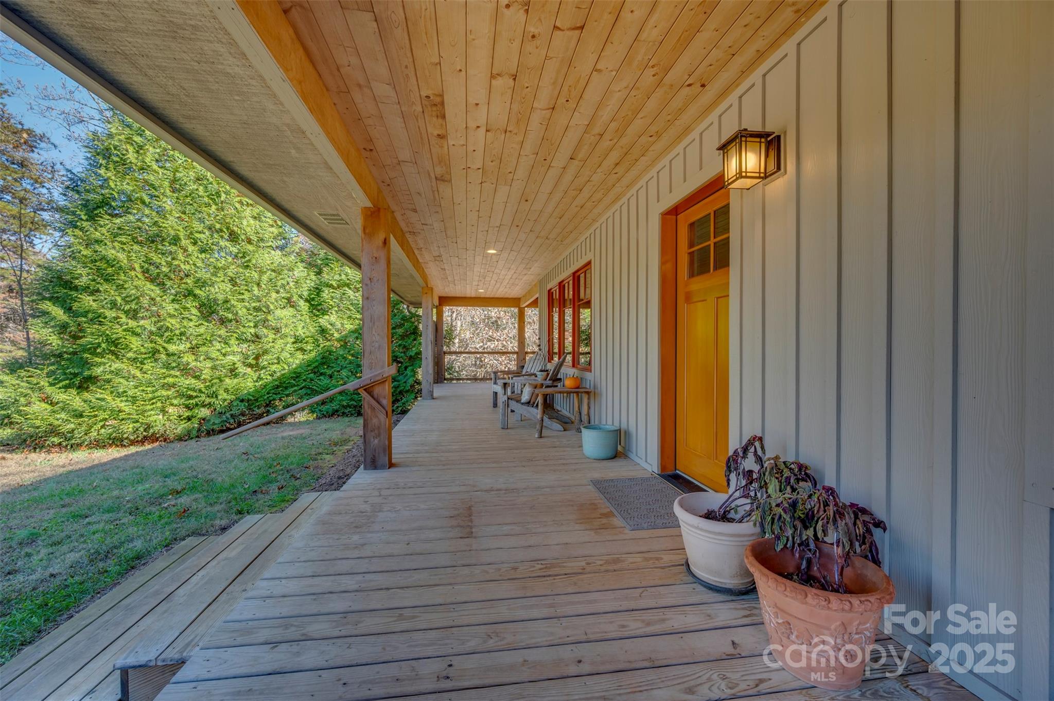 891 Meadow Crest Road Tryon, NC 28782 - Photo 2 of 47 a room with wooden floor table and chairs