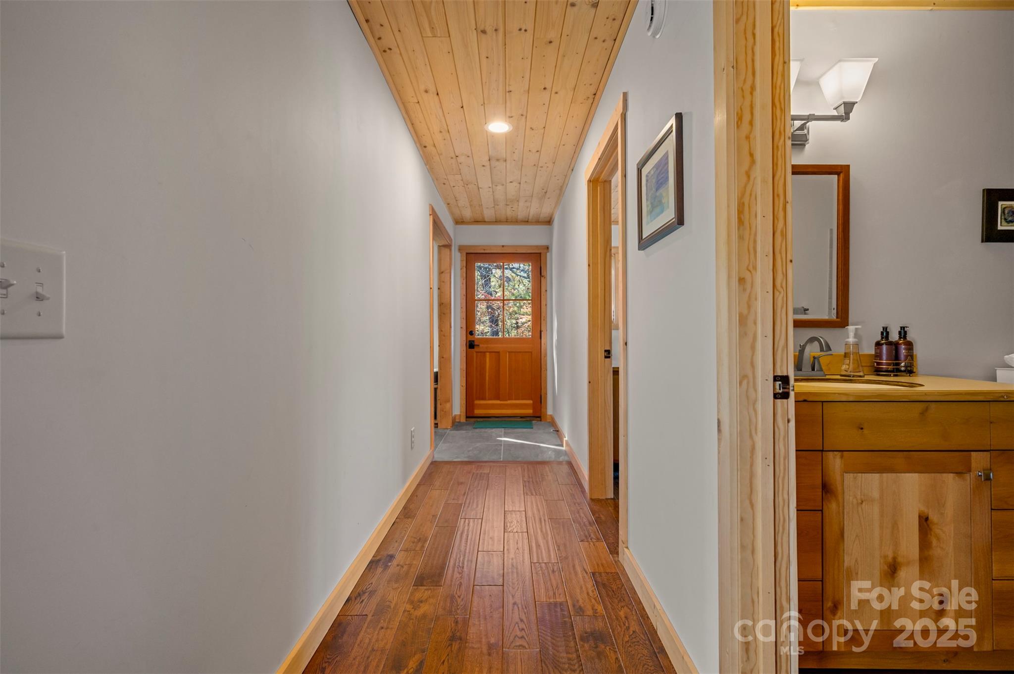 891 Meadow Crest Road Tryon, NC 28782 - Photo 24 of 47 a view of gallery with wooden floor