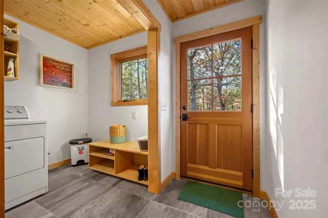 a utility room with dryer and washer