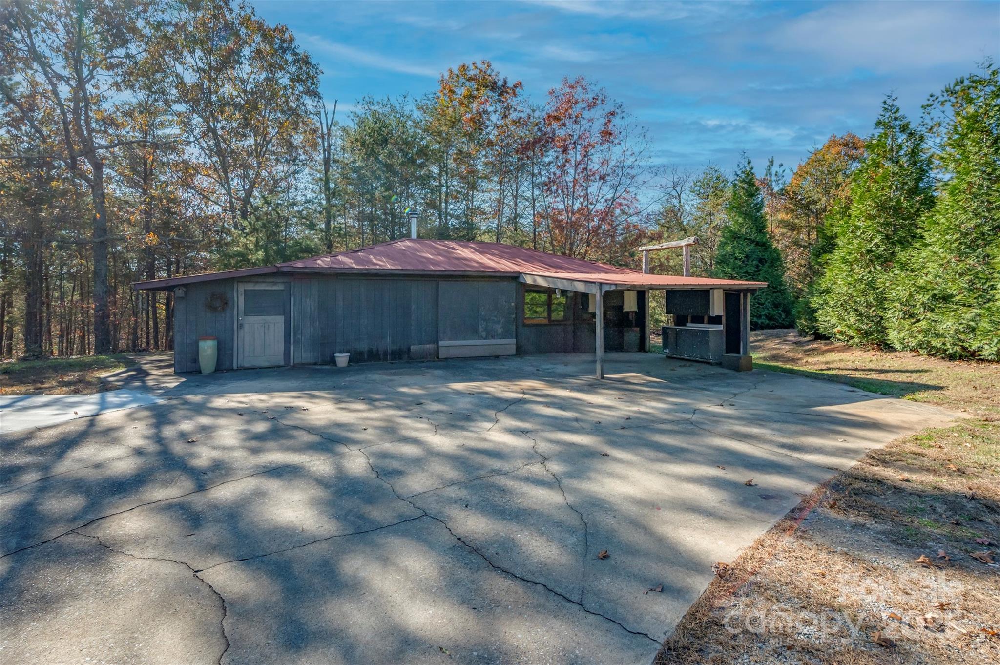 891 Meadow Crest Road Tryon, NC 28782 - Photo 32 of 47 a view of a house with a yard