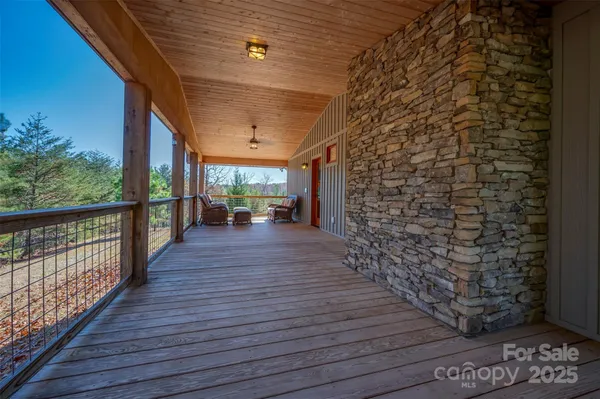 a view of a patio outdoor space and wooden deck