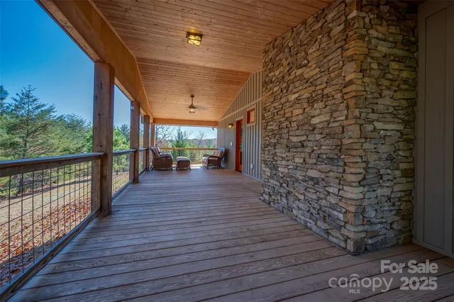 a view of a patio outdoor space and wooden deck