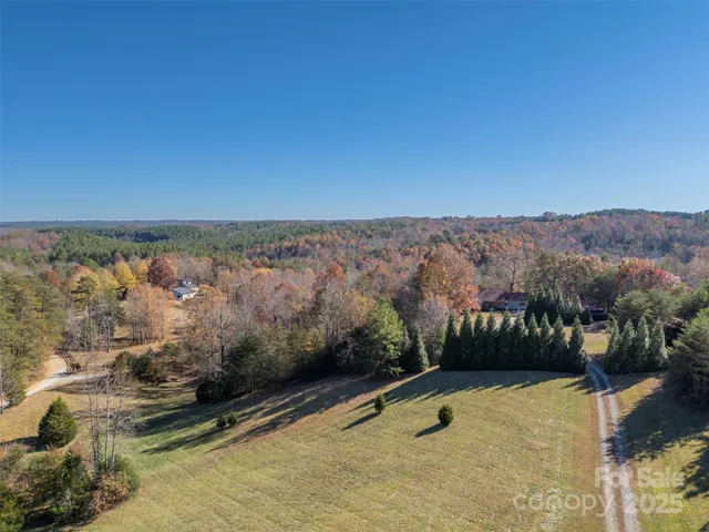 a view of a town with mountains in the background