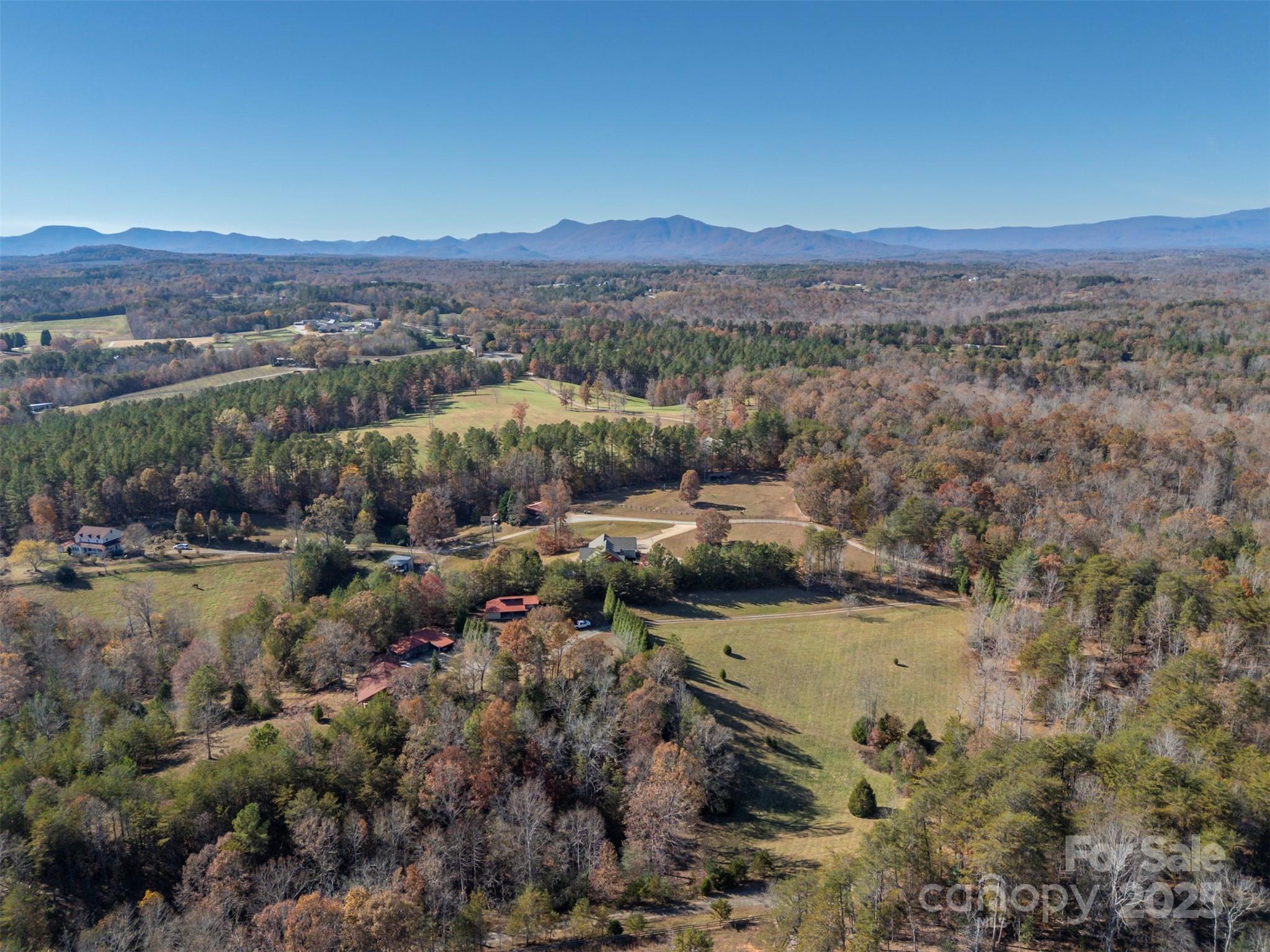 891 Meadow Crest Road Tryon, NC 28782 - Photo 45 of 47 a view of a lake with mountains in the background
