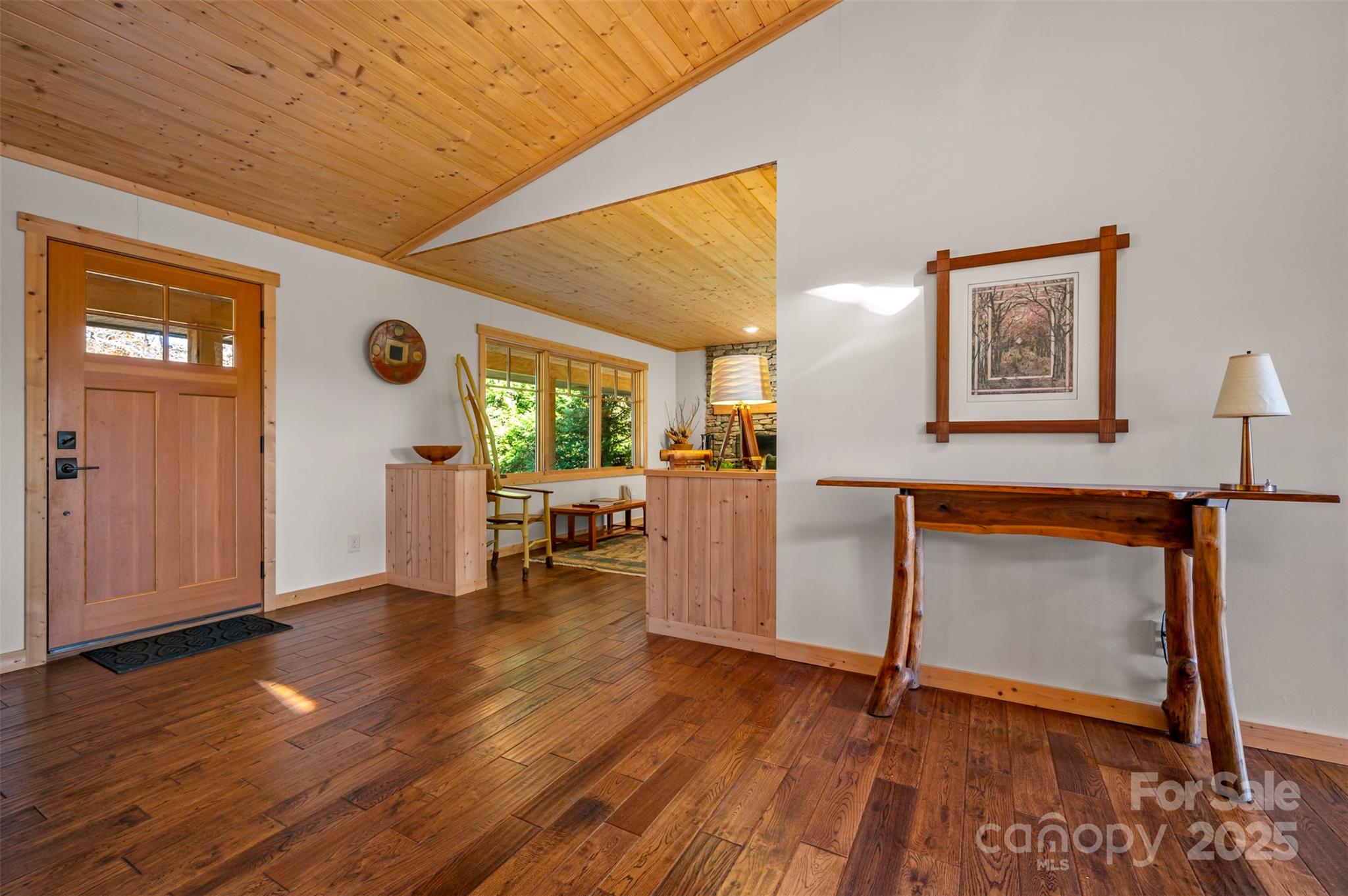 891 Meadow Crest Road Tryon, NC 28782 - Photo 8 of 47 a view of an empty room with kitchen and a window