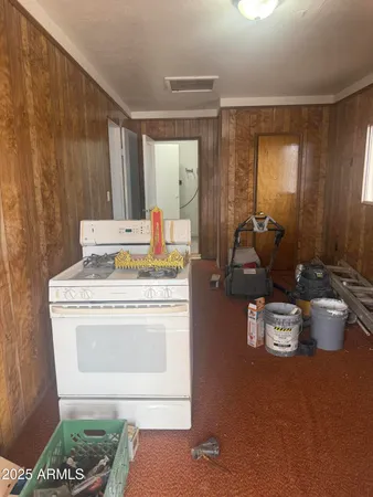 a kitchen with a stove and a sink