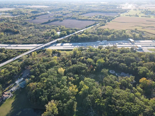 an aerial view of residential house with outdoor space