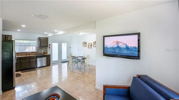 a view of a living room and dining room