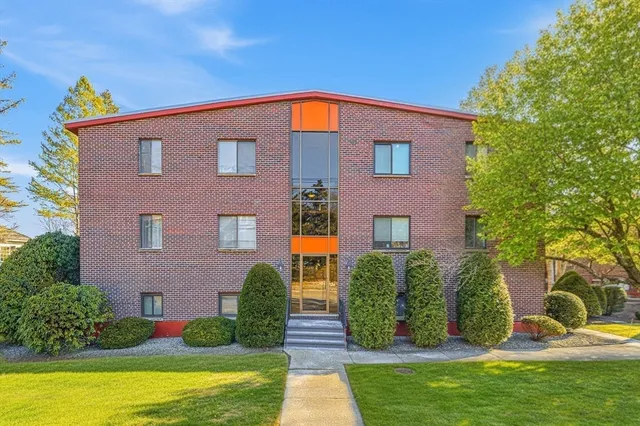 a front view of a house with swimming pool