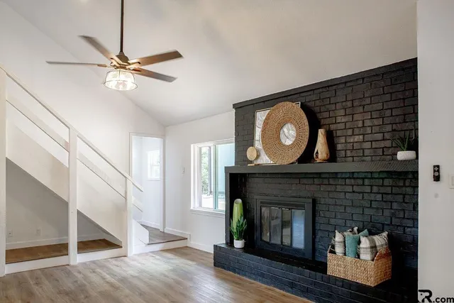 a living room with a wooden floor
