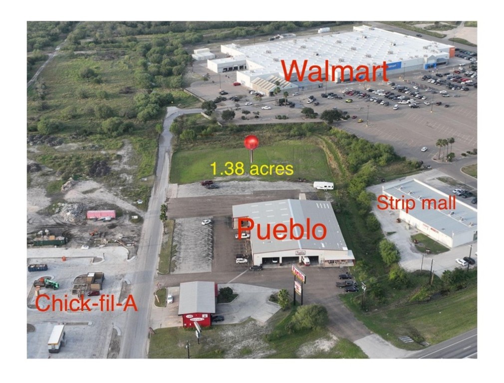 2511 East Main Street Alice, TX 78332 - Photo 2 of 5 a sign that is on the wall of building