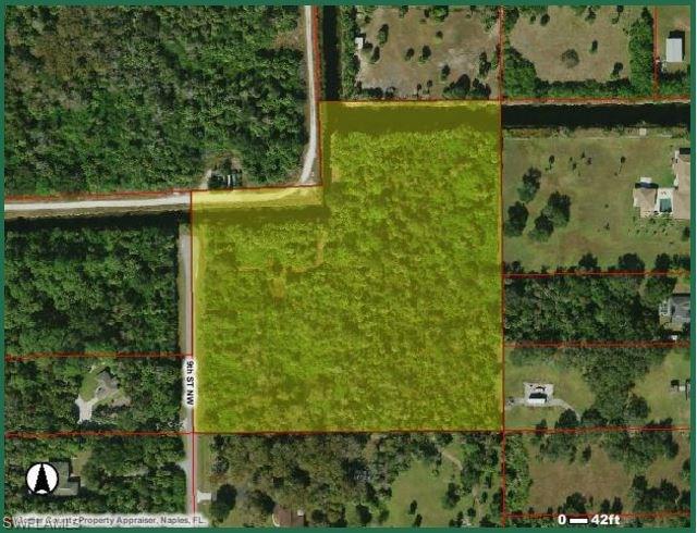 9th Street Northwest Naples, FL 34120 - Photo 2 of 8 a view of a garden
